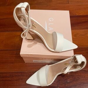 Glaze White Pointed Toe Ankle Strap Heels With A Polished Accent